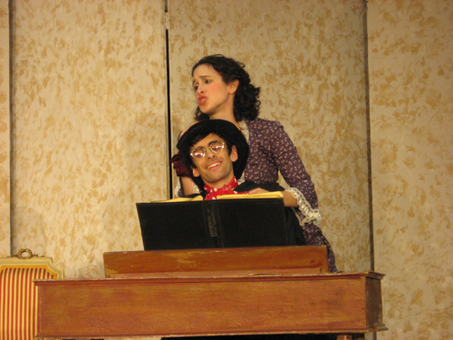 "Lindoro," disguised as a music teacher, plays for Rosina
